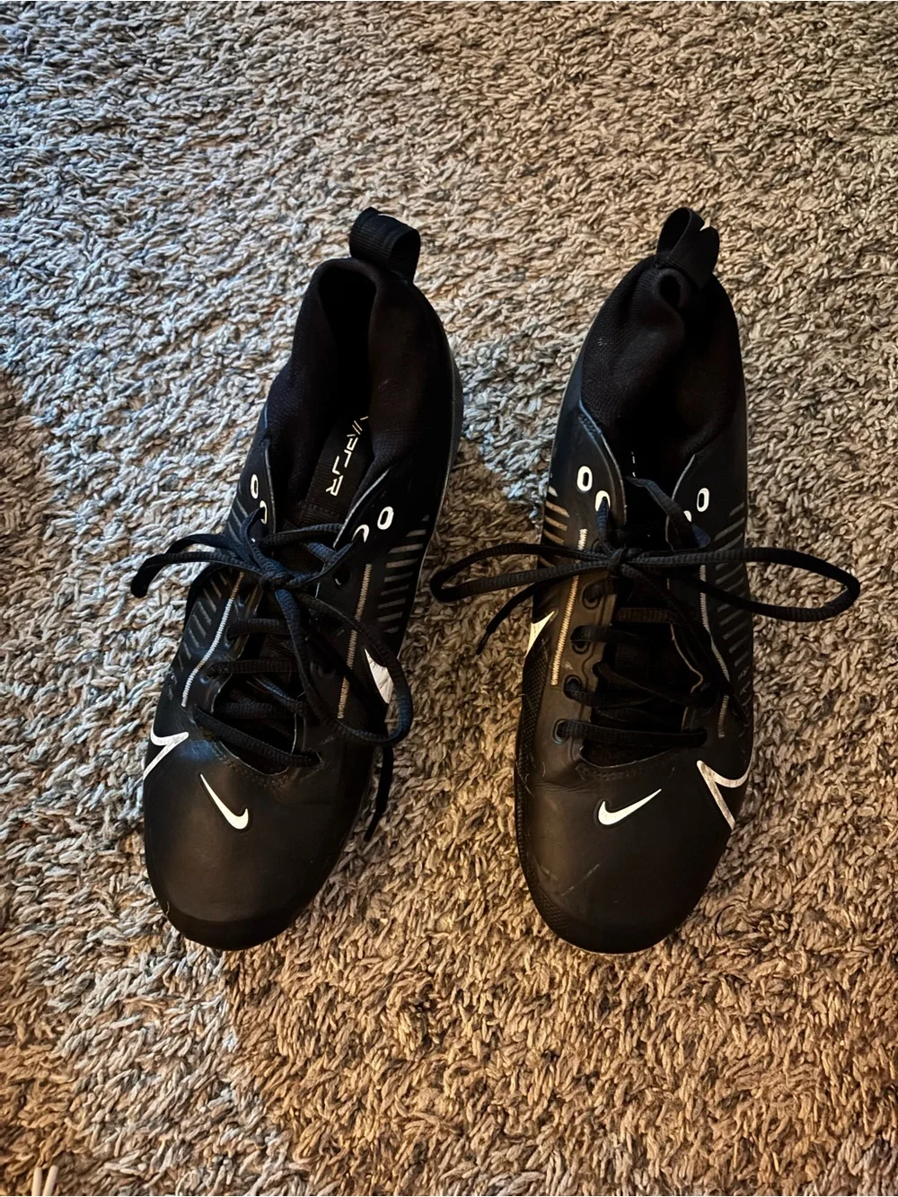 Nike Black Soccer Cleats with White Swoosh Accents